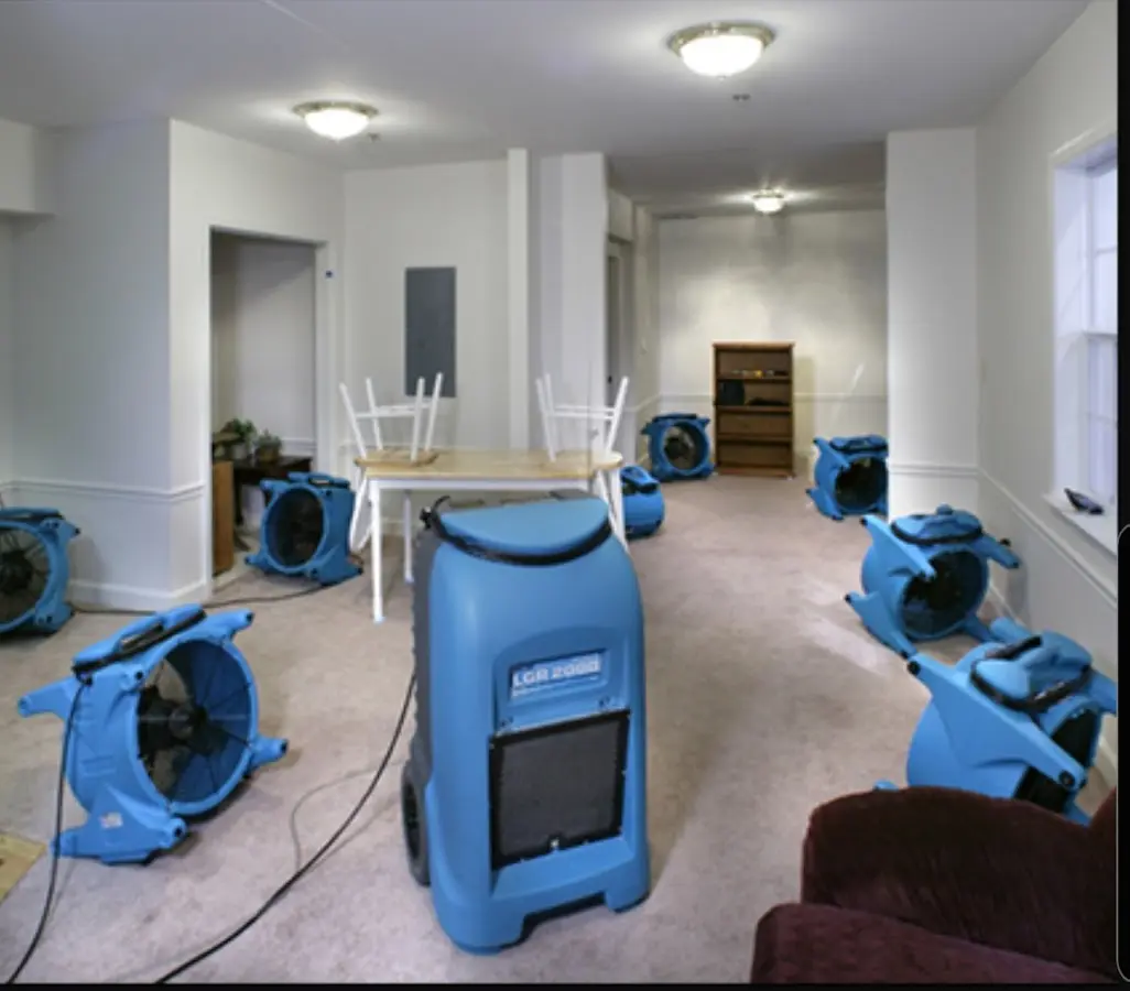 Air movers and dehumidifier setup for Water Damage Restoration in Lynnfield